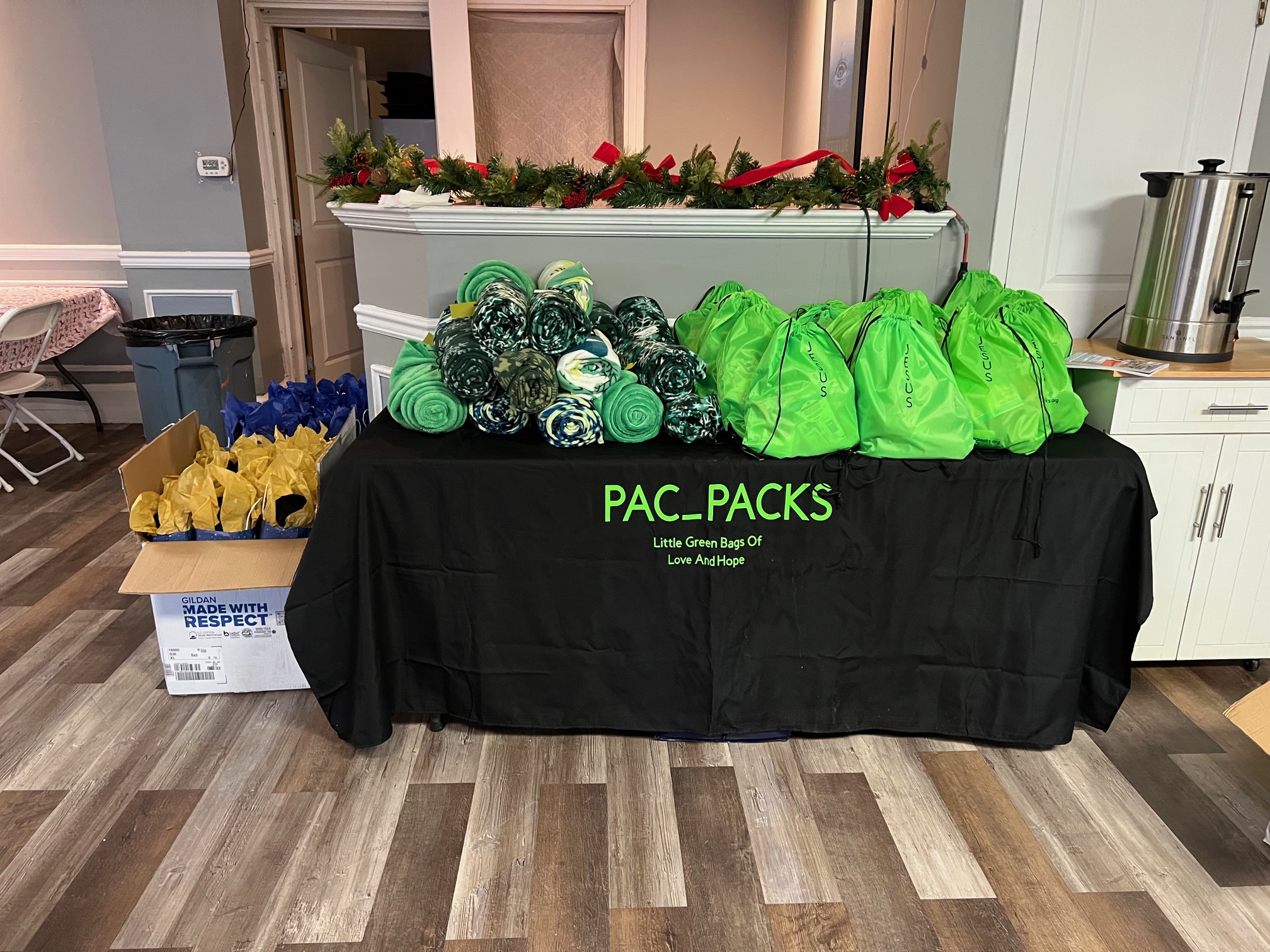 Pac_Packs and blankets on table